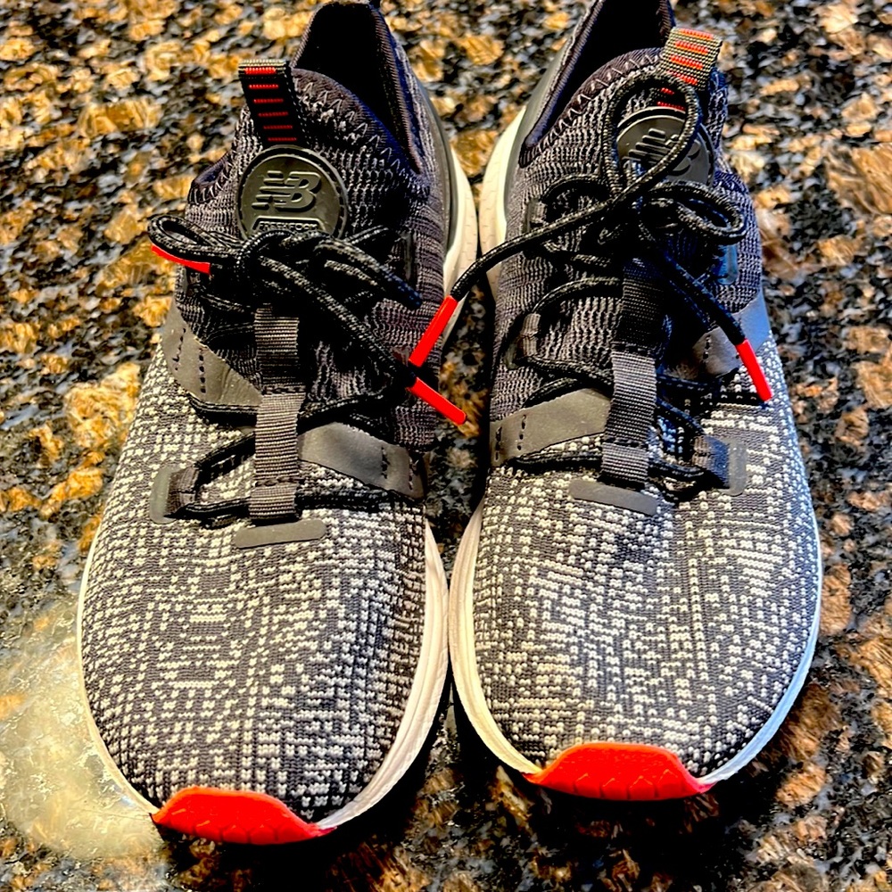 New Balance running shoes Women’s 7.5 worn a couple times  Like New